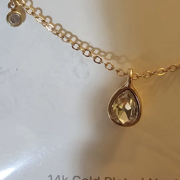 ettika Gold Plated Teardrop Pendant Necklace with Accent Charms. - Picture 2 of 4